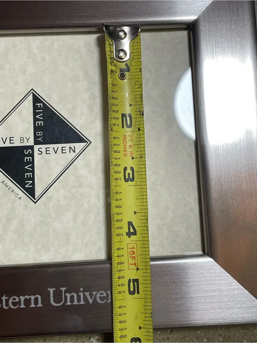 Northeastern University holds 5”x7”